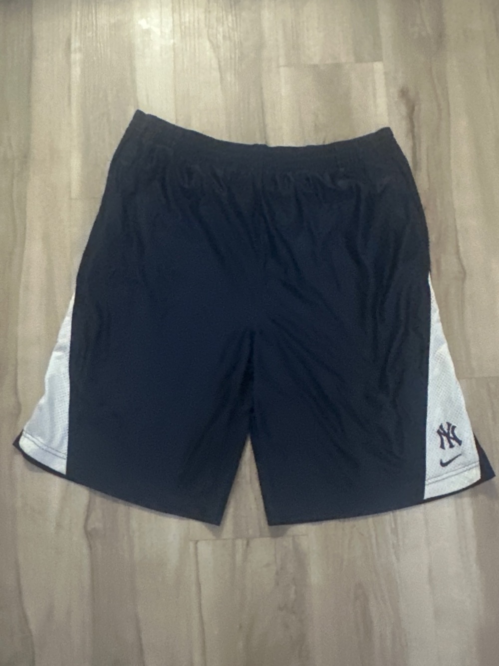 Nike Black Athletic Shorts with White Side Panels and NY Logo
